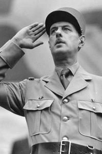 Charles de Gaulle salutes the Allied colors during a Bastille Day review in Algiers, July 1943. (National Archives)