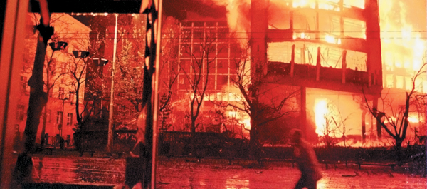 Serbia’s Ministry of the Interior burns on April 2, 1999, during the NATO air campaign. (© Yannis Kontos/Sygma/Corbis) 