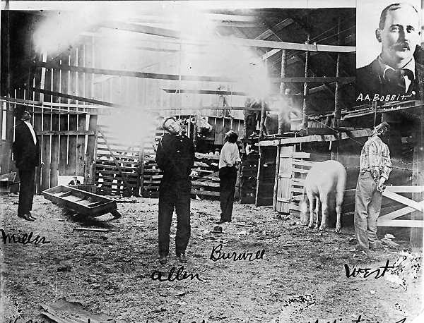 Jim Miller, Joe Allen, Berry Burrell and Jesse West hang in the Frisco barn in Ada, Okla. Photographer N.B. Stall captured the scene in 1909. This print includes an inset photo of Miller's murder-for-hire victim, Allen Augustus "Gus" Bobbitt. (Ellis Lindsey Collection)
