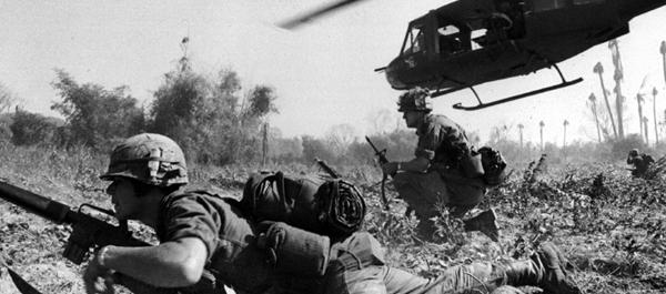 Major Bruce Crandall’s UH-1 Huey dispatches Infantry while under fire during combat operations at Ia Drang Valley, Vietnam, November 1965. (U.S. Army)