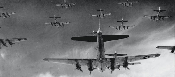 Eighth Air Force B-17Gs fly in formation toward Germany from England in early 1945. Although Blitzstein concluded his symphony with a choral exhortation to “Bomb [the enemy] from the earth,” he also warned that the destruction wrought by air power could create new enemies. (U.S. Air Force)