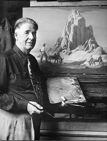 Ed Ainsworth took this photograph of Clyde Forsythe in front of one of his desert paintings. [© David D. de Haas, M.D. collection]