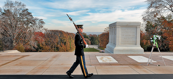 A soldier of the 3rd U.S. Infantry (The Old Guard) walks his post at the Tomb of the Unknowns, chief of Arlington's many memorials. (Photo by Staff Sgt. Joseph Rivera Rebolledo/Puerto Rico National Guard/Department of Defense)