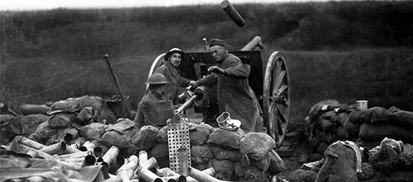 Western Front, France, 1918:  Soldiers of the American Expeditionary Force fire a French M-1897 75mm field gun, a revolutionary, highly accurate rapid-fire weapon with an effective range of nearly 7,000 meters. (U.S. Army/National Archives)