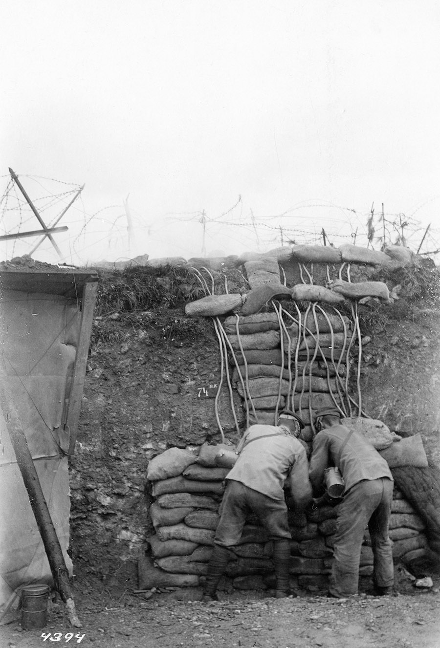 German soldiers lay out lead pipes for releasing poison gas as the prelude to an assault on the Allied trench line in August 1917. The first chlorine gas attacks in April 1915 were spewed from canisters, but the vagaries of the wind and weather made that method of dispersal impracticable. (National Archives)