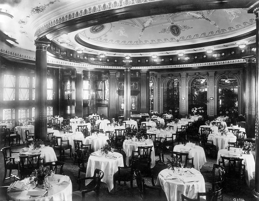 The world’s largest steamship when built, luxury liner Vaterland boasted elegant architecture and furnishings. It featured a winter garden, swimming pool and therapeutic spa rooms, smoking rooms, and a glass-roofed social hall with theatrical stage. The 800-seat dining room (above), a replica of New York City’s Ritz-Carleton’s, was finished with mahogany, walnut, gold, and bronze. (AKG-Images)