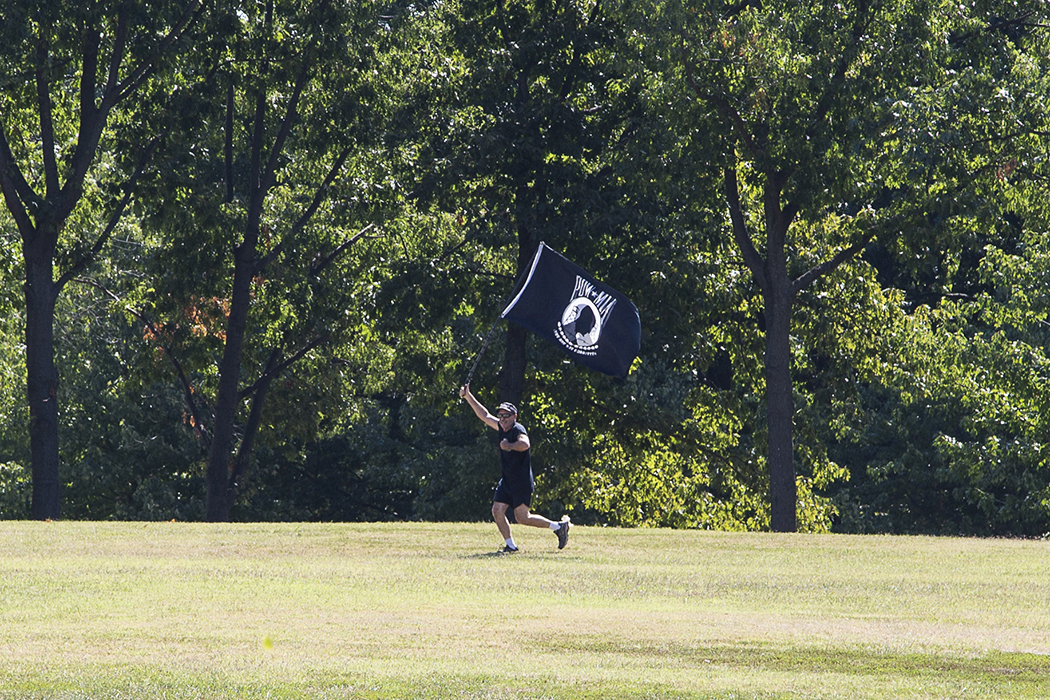 Bowen always carried the POW/MIA flag when he ran. 