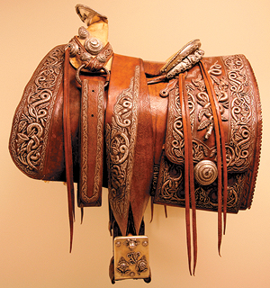 Among the masterworks at the Briscoe is Pancho Villa's last known saddle, with elaborate tooling and silver accents. (Briscoe Western Art Museum Collection)