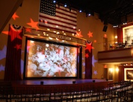 Live entertainment performs programs in the Stage Door Canteen.